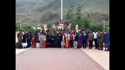 Veterans of three services with their families at Kargil War Memorial on Thursday.