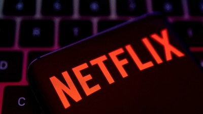 Smartphone with Netflix logo is placed on a keyboard. (REUTERS)