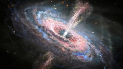 This artist's concept shows a galaxy with a brilliant quasar, a very bright, distant and active supermassive black hole that is millions to billions of times the mass of the Sun, at its center, seen in this undated handout picture. NASA, ESA and J. Olmsted (STScI)/Handout via REUTERS (via REUTERS)