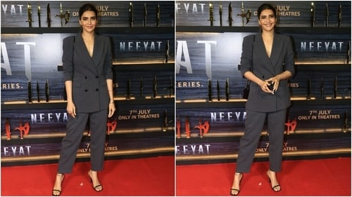 Karishma Tanna attends Neeyat screening in a dark grey pantsuit. (HT Photo/Varinder Chawla) Karishma Tanna attends Neeyat screening in a dark grey pantsuit. (HT Photo/Varinder Chawla)