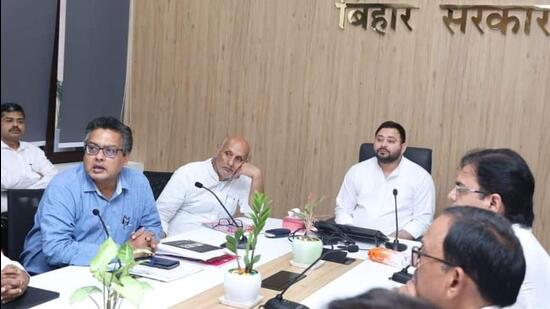 Bihar deputy chief minister Tejashwi Yadav at a meeting to review working of education department along with minister Chandrashekhar (second from left) (File Photo)