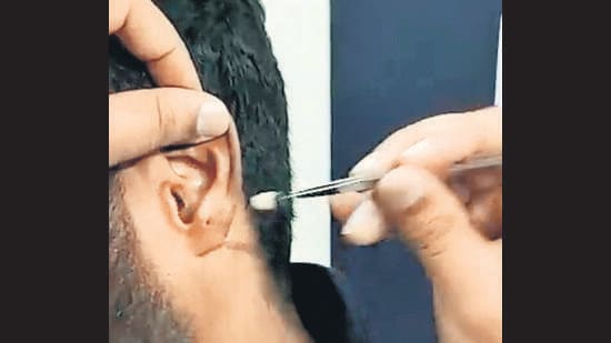 During the written examination, the police officer added, the invigilators noticed suspicious movements of certain candidates, based on which the police had questioned five aspirants and checked their answer sheets. He said that some of the candidates wrote the answers without even reading the questions. (HT PHOTO)