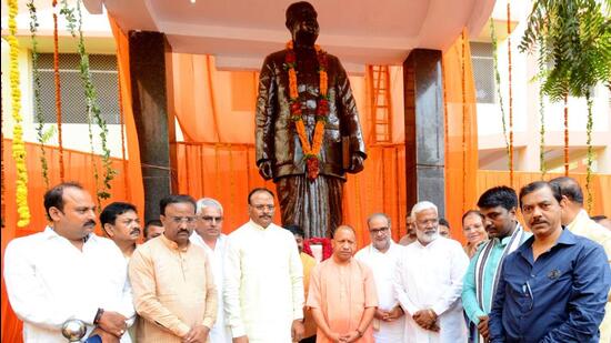 Uttar Pradesh chief minister Yogi Adityanath and other BJP leaders after paying tribute to Syama Prasad Mookerjee on his birth anniversary, in Lucknow on Thursday. (HT PHOTO)