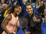 Serena Williams and Roger Federer click a selfie.