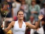 Ukraine's Marta Kostyuk celebrates beating Greece's Maria Sakkari during their women's singles tennis match on the third day of the 2023 Wimbledon Championships at The All England Tennis Club.