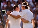 Greece’s Stefanos Tsitsipas with Britain’s Andy Murray after winning their second round match 