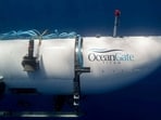 FILE PHOTO: The Titan submersible, operated by OceanGate Expeditions to explore the wreckage of the sunken SS Titanic off the coast of Newfoundland, dives in an undated photograph.  OceanGate Expeditions/Handout via REUTERS  NO RESALES. NO ARCHIVES. THIS IMAGE HAS BEEN SUPPLIED BY A THIRD PARTY./File Photo