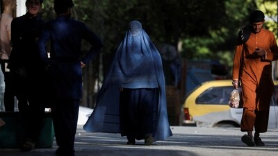 Afghanistan: An Afghan woman walks on a street in Kabul, Afghanistan. (Reuters)