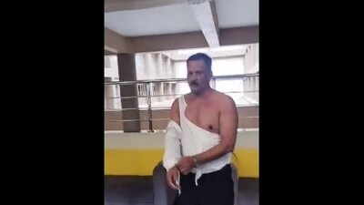 Screengrab from the viral video of Pune's DY Patil High School principal being attacked.