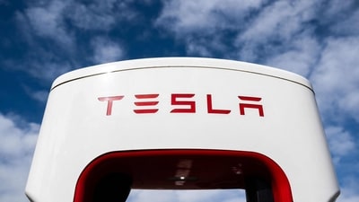 A Tesla Supercharger electrical vehicle charging station is seen in Falls Church, Virginia. (AFP) A Tesla Supercharger electrical vehicle charging station is seen in Falls Church, Virginia. (AFP)