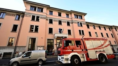 A firefighter vehicle is parked outside a retirement home after a fire killed six residents, in Milan on July 7, 2023. "Six people killed, numerous suffering from smoke inhalation hospitalised. Dozens of people saved by firefighters who immediately evacuated the building," the fire brigade said, adding the cause of the fire was not yet known.
Five of the victims were women aged between 69 and 87 years old, while the sixth was a 73-year-old man, AGI news agency said. (Photo by GABRIEL BOUYS / AFP) (AFP) A firefighter vehicle is parked outside a retirement home after a fire killed six residents, in Milan on July 7, 2023. "Six people killed, numerous suffering from smoke inhalation hospitalised. Dozens of people saved by firefighters who immediately evacuated the building," the fire brigade said, adding the cause of the fire was not yet known.
Five of the victims were women aged between 69 and 87 years old, while the sixth was a 73-year-old man, AGI news agency said. (Photo by GABRIEL BOUYS / AFP) (AFP)