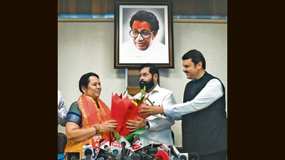 Mumbai, India - July 7, 2023: CM Eknath Shinde and Dy CM Devendra Fadnavis welcome Neelam Gore, after she joins Shiv Sena at Vidhan Bhavan in Mumbai, India, on Friday, July 7, 2023. (Photo by HT Photo/ Hindustan Times) (Hindustan Times) Mumbai, India - July 7, 2023: CM Eknath Shinde and Dy CM Devendra Fadnavis welcome Neelam Gore, after she joins Shiv Sena at Vidhan Bhavan in Mumbai, India, on Friday, July 7, 2023. (Photo by HT Photo/ Hindustan Times) (Hindustan Times)