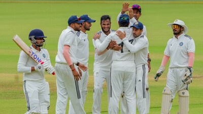 South Zone bowler Vyshak Vijaykumar with teammates celebrates after taking the wicket of North Zone batter Pulkit Narang (PTI) South Zone bowler Vyshak Vijaykumar with teammates celebrates after taking the wicket of North Zone batter Pulkit Narang (PTI)
