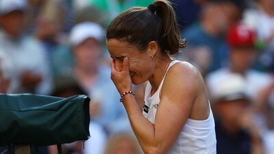 France's Alize Cornet reacts after sustaining an injury during her second round match against Kazakhstan’s Elena Rybakina (REUTERS)
