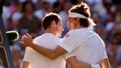 Greece’s Stefanos Tsitsipas with Britain’s Andy Murray after winning their second round match (REUTERS)