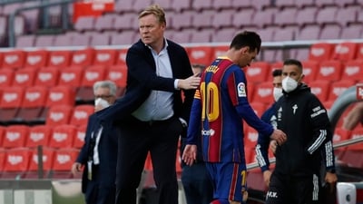 Barcelona's former captain Lionel Messi and former manager Ronald Koeman. (REUTERS)