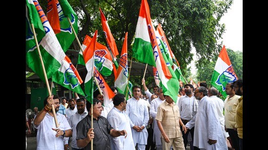 Congress workers during a protest against the Gujarat high court verdict on Rahul Gandhi, at AICC headquarters in New Delhi on Friday. (HT/Vipin Kumar)