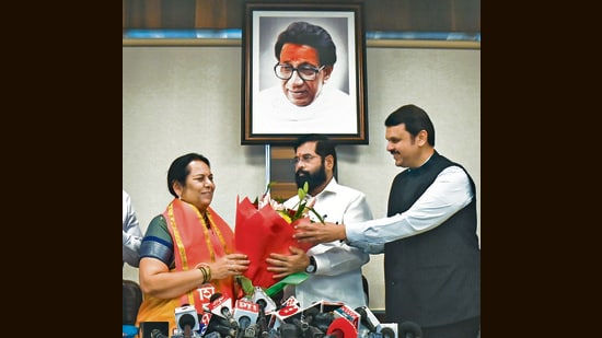 Mumbai, India - July 7, 2023: CM Eknath Shinde and Dy CM Devendra Fadnavis welcome Neelam Gore, after she joins Shiv Sena at Vidhan Bhavan in Mumbai, India, on Friday, July 7, 2023. (Photo by HT Photo/ Hindustan Times) (Hindustan Times)