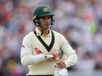 Alex Carey walks after losing his wicket