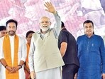 Prime Minister Narendra Modi with Union ministers G Kishan Reddy and Nitin Gadkari in Warangal on Saturday. (PTI) Prime Minister Narendra Modi with Union ministers G Kishan Reddy and Nitin Gadkari in Warangal on Saturday. (PTI)