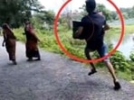 In a video, shared by the BJP, a man can be purportedly seen running with a ballot box during the West Bengal panchayat poll. In a video, shared by the BJP, a man can be purportedly seen running with a ballot box during the West Bengal panchayat poll.