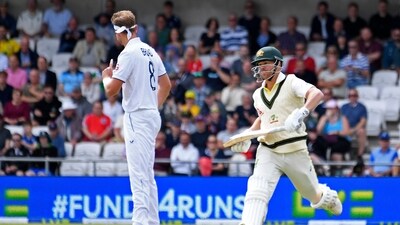 Australia's David Warner, right, runs past England's Stuart Broad to score during the first day of the third Ashes Test (AP) Australia's David Warner, right, runs past England's Stuart Broad to score during the first day of the third Ashes Test (AP)