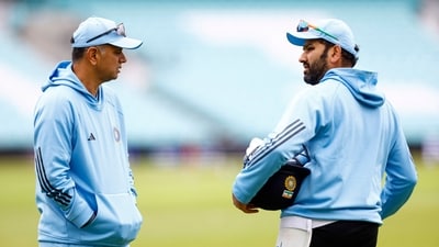 India's Rohit Sharma (R) with head coach Rahul Dravid during practice ahead of 2023 WTC Final (Action Images via Reuters)
