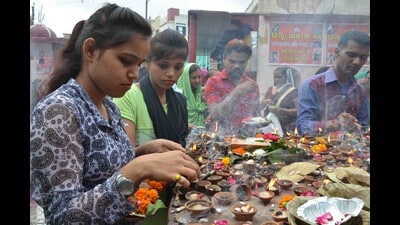 Devotees offering prayers at a Shiva temple in Agra during a fair organised on a Monday of the Shravan month. HT File (HT File) Devotees offering prayers at a Shiva temple in Agra during a fair organised on a Monday of the Shravan month. HT File (HT File)
