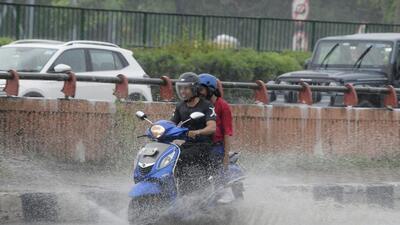 Gurugram, India-July 08, 2023: Commuters make their way along the National Highway-48 during a monsoon rainfall near sector-32, in Gurugram, India, on Saturday, 08 July 2023. (Photo by Parveen Kumar/Hindustan Times)