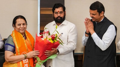 Mumbai: Maharashtra Chief Minister Eknath Shinde with Deputy Chief Minister Devendra Fadnavis and Maharashtra Legislative Council Deputy Chairperson Neelam Gorhe after she joined Eknath Shinde-led Shiv Sena during a press conference, in Mumbai. (PTI) Mumbai: Maharashtra Chief Minister Eknath Shinde with Deputy Chief Minister Devendra Fadnavis and Maharashtra Legislative Council Deputy Chairperson Neelam Gorhe after she joined Eknath Shinde-led Shiv Sena during a press conference, in Mumbai. (PTI)