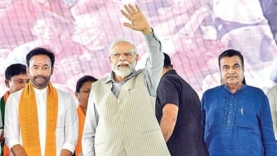 Prime Minister Narendra Modi with Union ministers G Kishan Reddy and Nitin Gadkari in Warangal on Saturday. (PTI) Prime Minister Narendra Modi with Union ministers G Kishan Reddy and Nitin Gadkari in Warangal on Saturday. (PTI)