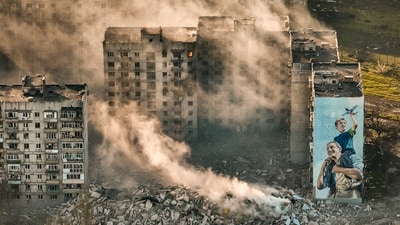 Smoke rises from a building in Bakhmut, the site of the heaviest battles with the Russian troops in the Donetsk region. (AP) Smoke rises from a building in Bakhmut, the site of the heaviest battles with the Russian troops in the Donetsk region. (AP)