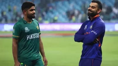 Babar Azam with Virat Kohli (File Photo) Babar Azam with Virat Kohli (File Photo)