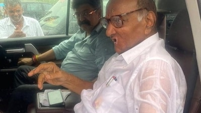 Supriya Sule shared a photo of Sharad Pawar drenched in rain as he reached Nashik. Supriya Sule shared a photo of Sharad Pawar drenched in rain as he reached Nashik.