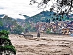 A temple submerged in the swollen Beas river in Himachal Pradesh’s Mandi district on Sunday. (PTI) A temple submerged in the swollen Beas river in Himachal Pradesh’s Mandi district on Sunday. (PTI)