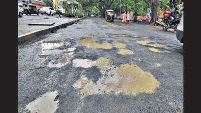 “Yes, potholes have resurfaced on some roads, and we are monitoring every major pothole,” Bangar said. “The potholes have surfaced on Majiwada flyover which is maintained by PWD, but TMC has taken the responsibility of filling potholes. We are filling new potholes every two days on that flyover.” (Praful Gangurde / HT Photo) “Yes, potholes have resurfaced on some roads, and we are monitoring every major pothole,” Bangar said. “The potholes have surfaced on Majiwada flyover which is maintained by PWD, but TMC has taken the responsibility of filling potholes. We are filling new potholes every two days on that flyover.” (Praful Gangurde / HT Photo)