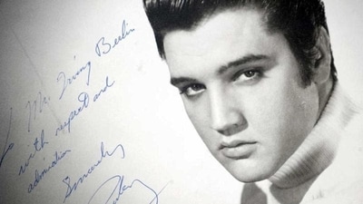 An original photograph of Elvis Presley autographed and inscribed to songwriter and compose Irving Berlin on auction at Gotta Have It! store in New York City. (Michael Loccisano/Getty Images/AFP) An original photograph of Elvis Presley autographed and inscribed to songwriter and compose Irving Berlin on auction at Gotta Have It! store in New York City. (Michael Loccisano/Getty Images/AFP)