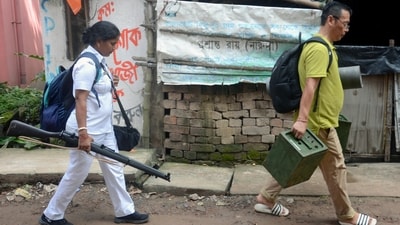 Polling staff leave for their respective polling stations after collecting polling equipment. (ANI)