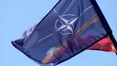 The NATO and Lithuanian flags fly in Vilnius, Lithuania on July 9, 2023, a few days ahead of a July 11-12 NATO Summit. (Photo by PETRAS MALUKAS / AFP) (AFP)
