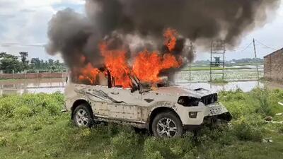 Smokes and flame billow from a vehicle that has been set ablaze by miscreants after West Bengal elections, at Belon village under Chakulia police station limits, in Uttar Dinajpur on Sunday. (ANI) Smokes and flame billow from a vehicle that has been set ablaze by miscreants after West Bengal elections, at Belon village under Chakulia police station limits, in Uttar Dinajpur on Sunday. (ANI)