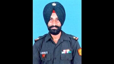 The slain Naib Subedar Kuldeep Singh from Chabhal Kalan in Punjab’s Tarn Taran is survived by his wife and two children. (HT Photo) The slain Naib Subedar Kuldeep Singh from Chabhal Kalan in Punjab’s Tarn Taran is survived by his wife and two children. (HT Photo)
