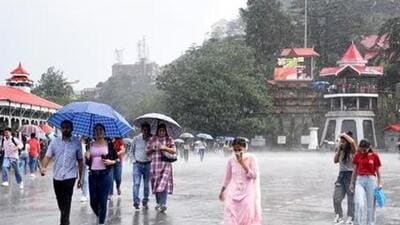 Visitors out in the rain at the Ridge in Shimla, Himachal Pradesh (File Photo) Visitors out in the rain at the Ridge in Shimla, Himachal Pradesh (File Photo)