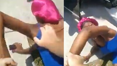 A shocking video shows a Florida cop dragging a pregnant black woman out of her car and pushing her to the ground (Daily Mail screenshot) A shocking video shows a Florida cop dragging a pregnant black woman out of her car and pushing her to the ground (Daily Mail screenshot)
