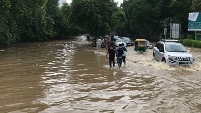 Waterlogging was witnessed in low-lying houses in DLF phases 1 and 3, Sector 4, 5, Palam Vihar, Sector 22, Sector 10A, Sector 9, Sector 48 and Suncity Township on Sunday morning. (Parveen Kumar/HT) Waterlogging was witnessed in low-lying houses in DLF phases 1 and 3, Sector 4, 5, Palam Vihar, Sector 22, Sector 10A, Sector 9, Sector 48 and Suncity Township on Sunday morning. (Parveen Kumar/HT)