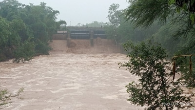 A view after the floodgates of Sukhna Lake in Chandigarh had to be opened as its water level crossed the danger mark of 1,164 feet in the wee hours of Sunday. (Sant Arora/ Hindustan Times) A view after the floodgates of Sukhna Lake in Chandigarh had to be opened as its water level crossed the danger mark of 1,164 feet in the wee hours of Sunday. (Sant Arora/ Hindustan Times)