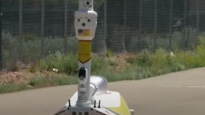 In case there is an armed invasion, the robot can take more aggressive action like pointing a laser beam at the suspect's chest and ask them to drop the weapons (YouTube/KRQE) In case there is an armed invasion, the robot can take more aggressive action like pointing a laser beam at the suspect's chest and ask them to drop the weapons (YouTube/KRQE)