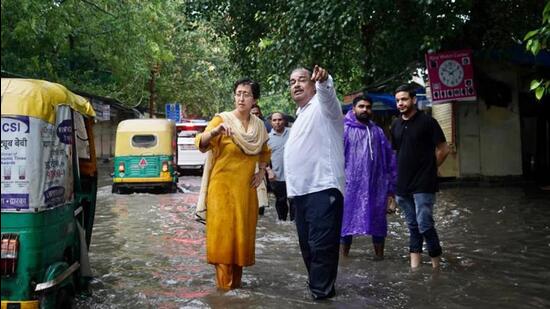 PWD minister Atishi inspects waterlogged areas near ITO, Delhi, on Sunday, July 9, 2023. (HT Photo)
