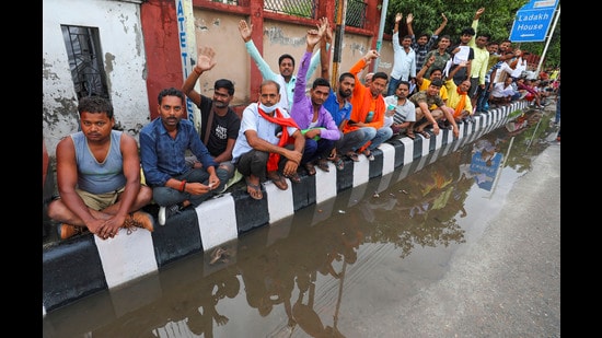 Pilgrims wait to get themselves registered for the Amarnath Yatra in Jammu. (PTI Photo)