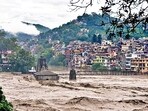 A temple submerged in the swollen Beas river in Himachal Pradesh’s Mandi district on Sunday. (PTI) A temple submerged in the swollen Beas river in Himachal Pradesh’s Mandi district on Sunday. (PTI)