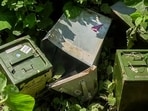 Three ballot boxes are found abandoned in the drain after violence erupted in the aftermath of West Bengal Panchayat elections in Murshidabad on Sunday. (ANI Photo) Three ballot boxes are found abandoned in the drain after violence erupted in the aftermath of West Bengal Panchayat elections in Murshidabad on Sunday. (ANI Photo)